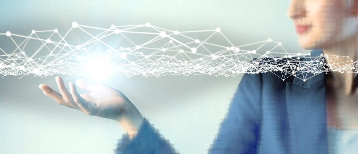 Lady in office of the future holding up digital project